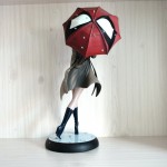 girl holding umbrella resin figure