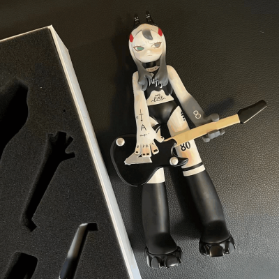 Boy talking guitar art resin toy